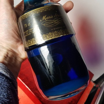 Antigua botella llena Brizard parfait amour sello cuatro pesetas