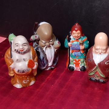 Lote 4 figuritas de Buda de porcelana