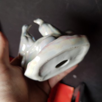 1. 50 € Palomas y sombrero figura de porcelana